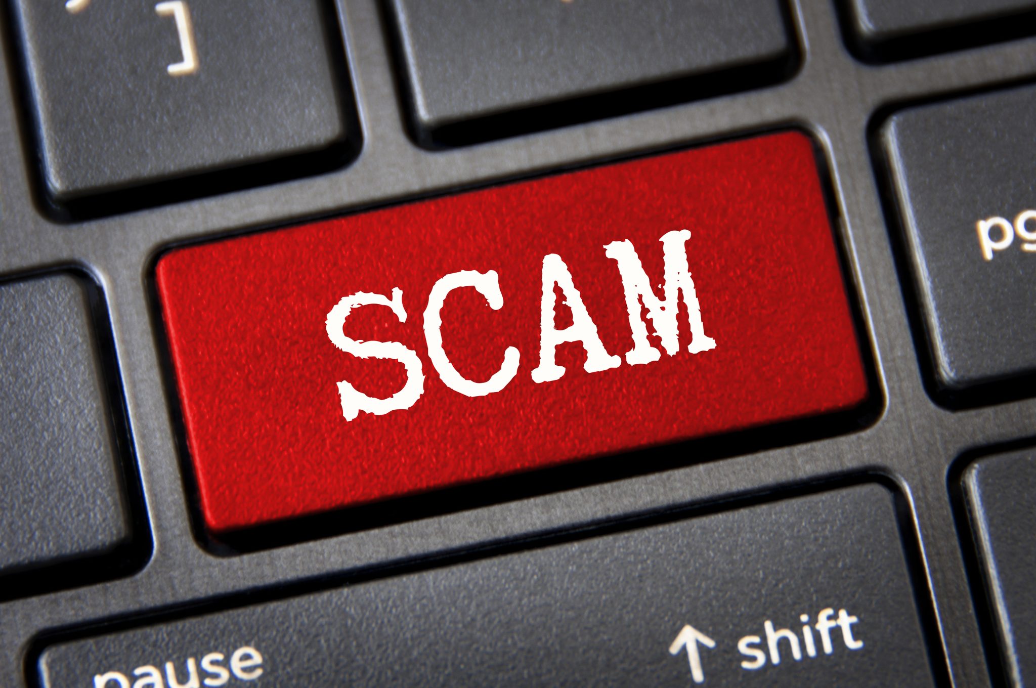 bigstock-Scam-Text-On-Red-Laptop-Tab-O-457525715-2048x1360 image